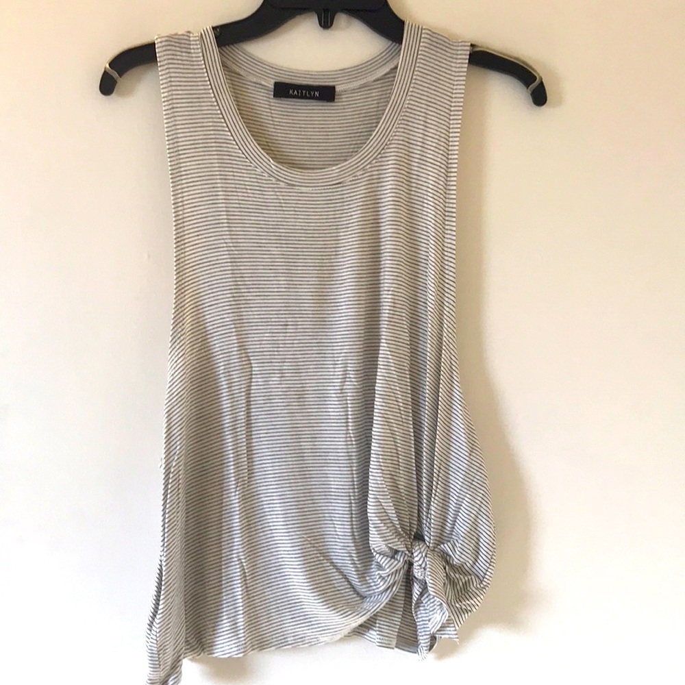 White tank with black stripes and side-tie.